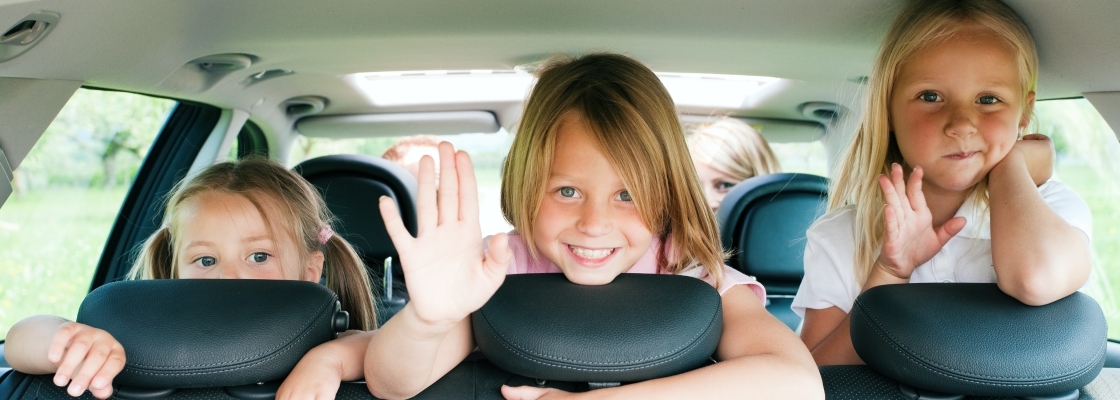 Family traveling by car